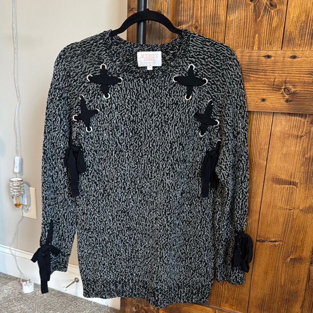 Black and White Sweater with Bow Accents